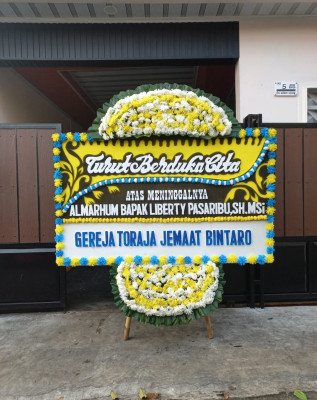Papan Bunga Duka di Sukasirna